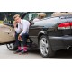 4lck Stylish Man with colourful socks sits in a car and calling by mobile phone