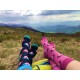 4lck pink socks with Mouth and tongue, feet with colourful socks at the mountain view