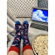 4lck colorful Socks with Popcorn and Drink on blue background